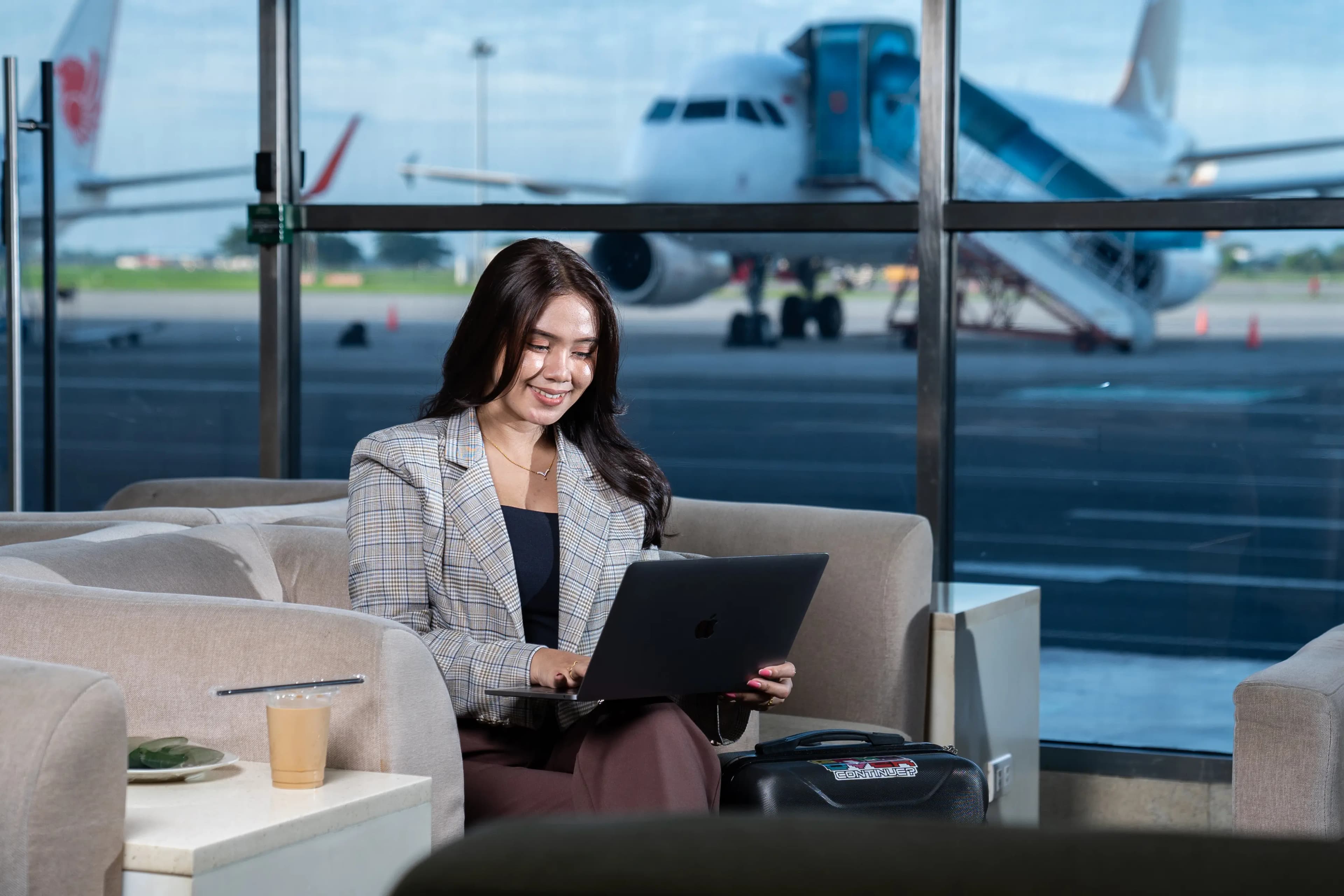 Passenger using free Wi-Fi at Kualanamu Airport